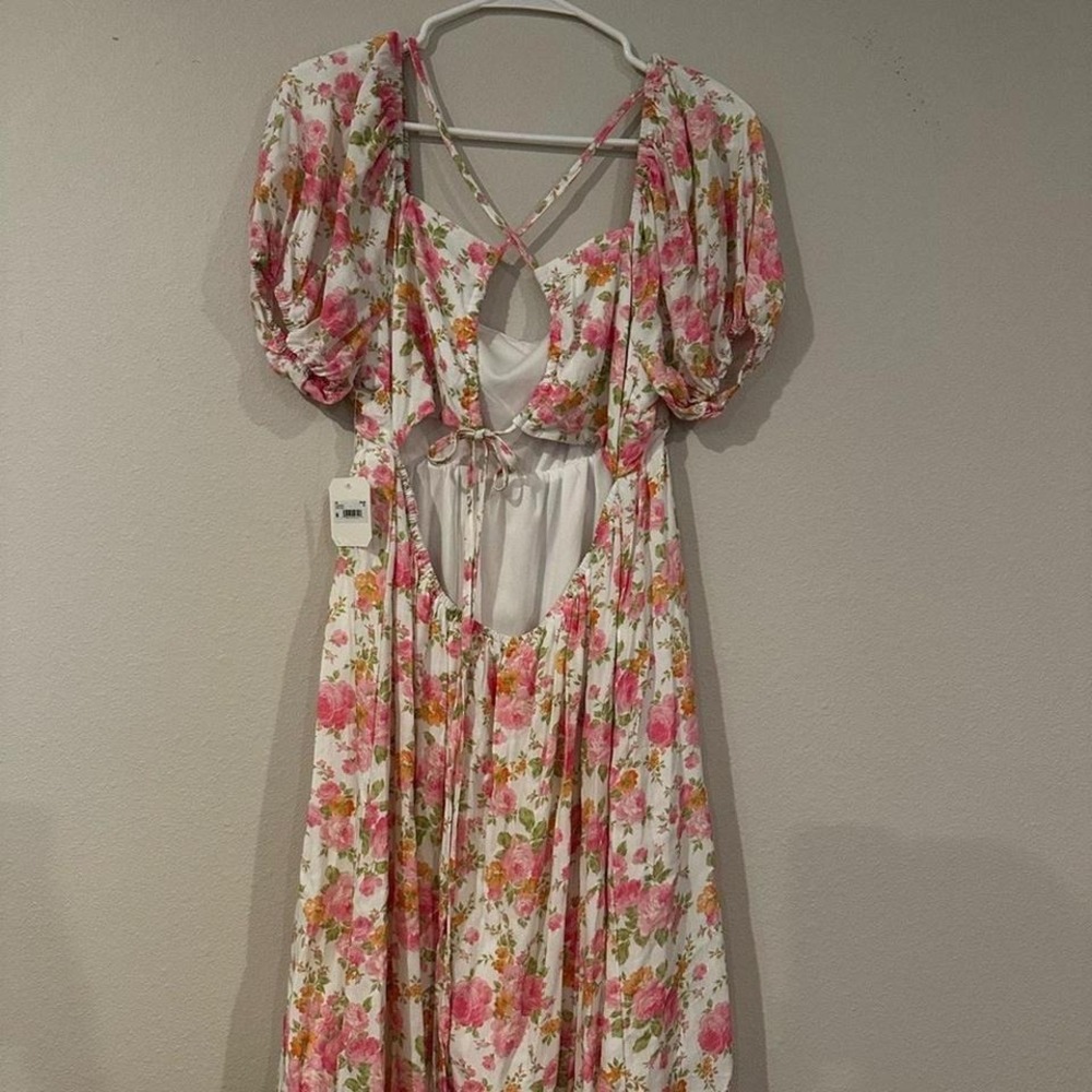 Alter'd State white wrs babydoll style dress with an open back in XL.
